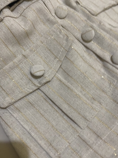 Conjunto short saia com cinto e Cropped paetê na internet