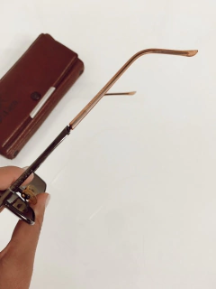 Óculos escuro marrom vintage original com estojo - loja online