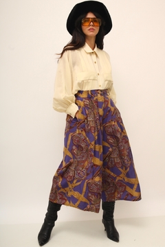Calça roxa pantacourt estampada