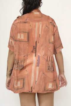 Camisa laranja vintage arvores na internet