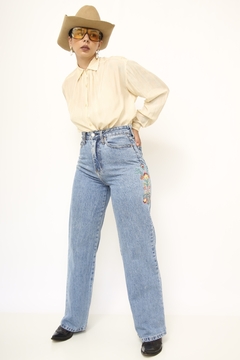 Calça jeans bordado cintura alta na internet