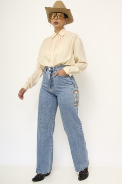 Calça jeans bordado cintura alta