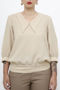 Imagem do Blusa bege golinha classica