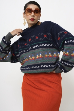 Pulover bonecos azul vintage na internet
