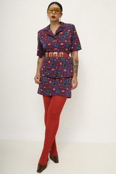 Conjunto roxo camisa + saia estampa bichos