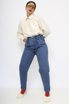 Calça jeans YSL vintage na internet