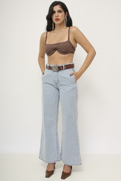 Calça jeans Wild Leg jeans clara - Capichó Brechó