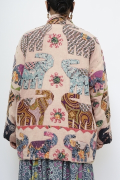 Jaqueta elefante vintage rosa na internet