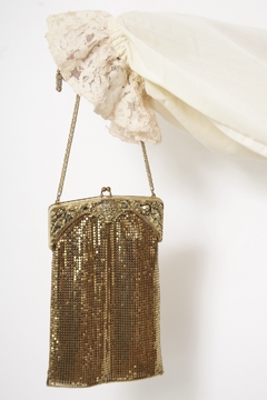 Imagem do Bolsa dourada fecho de anjo WHITING e DAVIS CO.BAGS