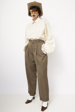 Calça verde cintura alta alfataria vintage na internet