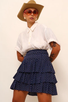 Saia cintura mega alta azul babados na internet