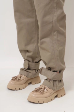 Imagem do macacao bege amplo ajuste mangas e barra