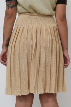 Imagem do saia tricot bege cintura alata pregas
