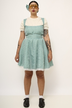 Vestido verde xadrez com laço na internet