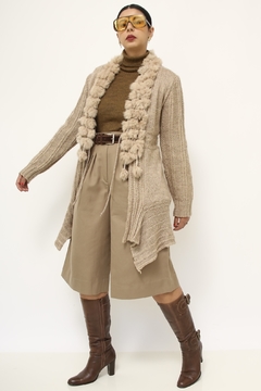 Cardigan tricot com recortes pelo na internet