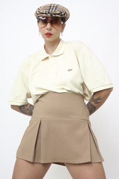 Polo amarelinha LACOSTE na internet