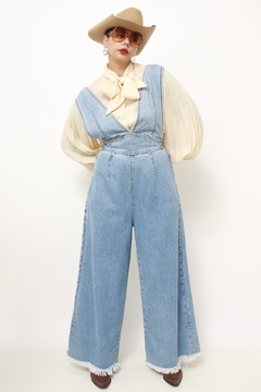 Macacao jeans flare amarração - Capichó Brechó