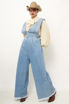 Macacao jeans flare amarração - Capichó Brechó