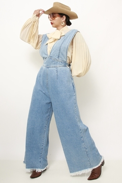 Macacao jeans flare amarração na internet