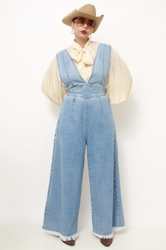 Macacao jeans flare amarração