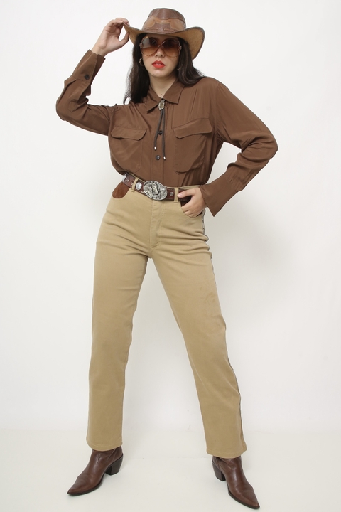 Calça jeans western bolso recorte couro