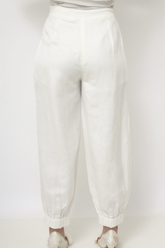 Calça bag creme cintura alta abertura perna