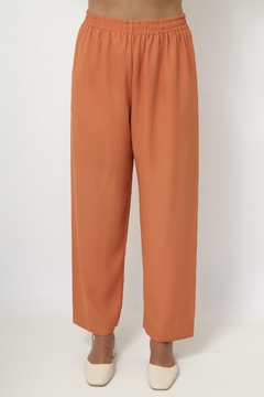 Calça laranja fininha poliester