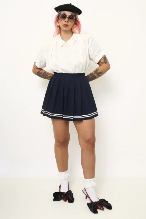 Saia azul lista pregas