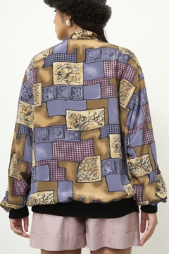 Blusa roxa estampa pala na internet