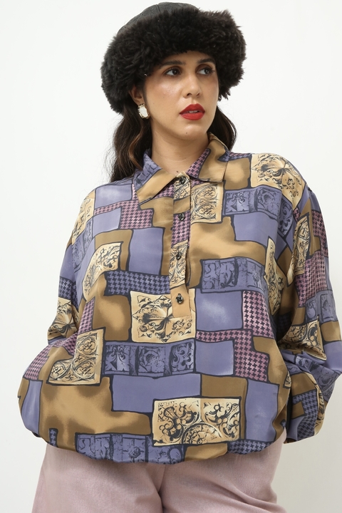 Blusa roxa estampa pala