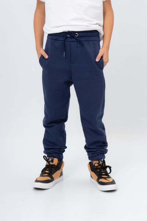 Jogger friza AZUL LISO COLEGIAL - comprar online