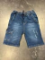 Bermuda jeans corte chino con Rotura