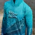Remera con capucha de ADULTOS - Surubí verde Edición 20 Años - Tiempo de Pesca Tienda