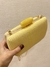 Bolsa clutch Dani na internet