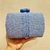 Bolsa clutch Daiana na internet