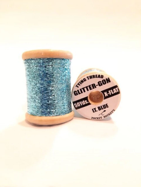 GLITTER GON 50 YDS X-FLAT LT BLUE POCKET ROCKET (GLITTERLTBLUE)