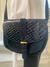 Cartera Mishka gamuza y cuero negra con hebilla dorada