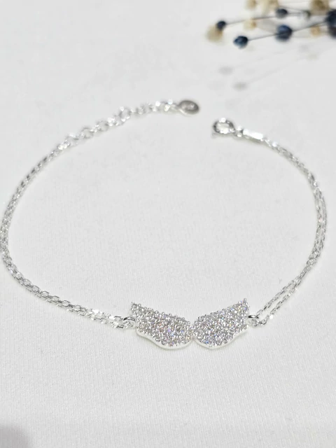Pulsera plata alas