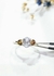 Anillo solitario plata y oro 18kl - Joyas Maia