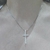 Cruz plata piedras