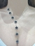 Collar corbatero acero flor negro - tienda online
