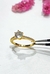 Anillo solitario acero dorado en internet