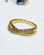 Anillo cruzado acero dorado