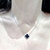 Collar acero trebol negro - comprar online