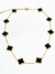 Collar acero dorado trebol negro