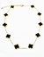 Collar acero dorado trebol negro - comprar online