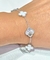 Pulsera acero trebol blanco y plateado - tienda online