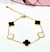 Pulsera acero dorado trebol blanco y negro