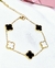 Pulsera acero dorado trebol blanco y negro - comprar online