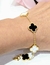 Pulsera acero dorado trebol blanco y negro - tienda online
